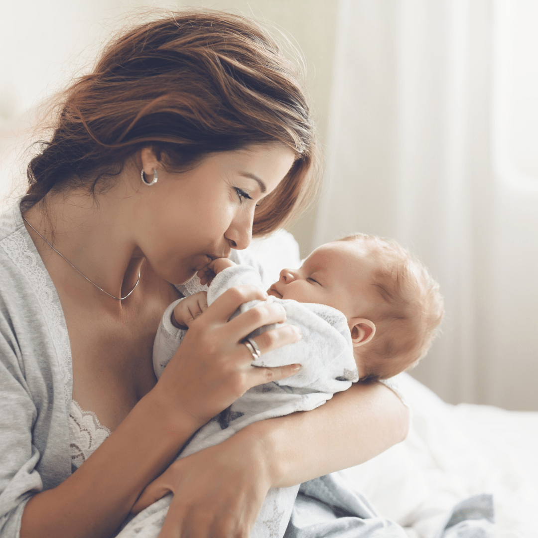 woman holding baby